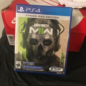 Call of duty Morden warfare two and Grandtheft auto V disc and case